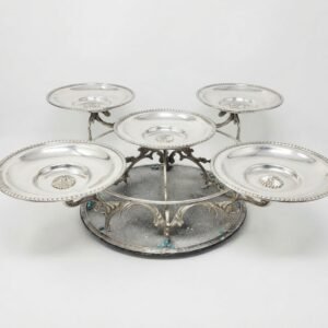 multi tiered silver plated serving stand with five plates